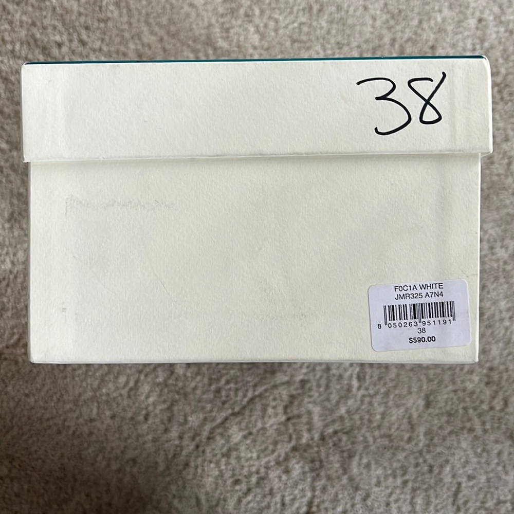 I purchased at Neiman Marcus for my son to attend a wedding. Great condition!!